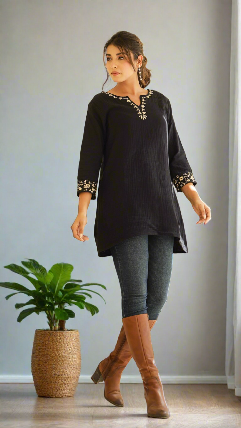 Black cotton kurti with embroidery on it